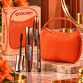 DEBORAH MILANO X O BAG COFANETTO -  Mascara Brown 12ml + Matita Occhi 03 Mat Brown 1,25g+ Mini O bag Orange