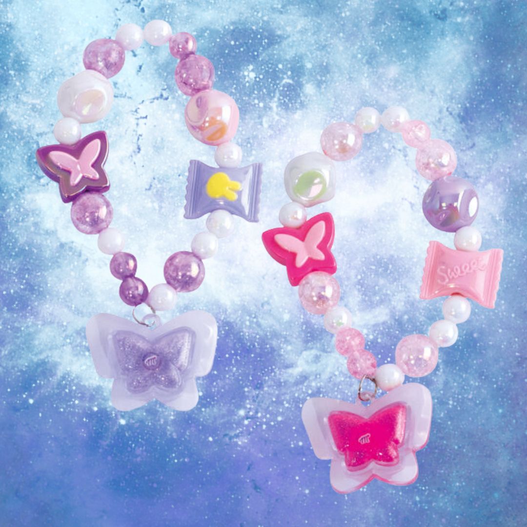 MARTINELIA MAGIC WINGS – Braccialetto con Balsamo Labbra, Fragola o Mirtillo