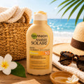 GARNIER AMBRE SOLAIRE LATTE PROTETTIVO GOLDEN PROTECT SPF 10 - Con Olio Di Monoï e Perle Dorate 200ml