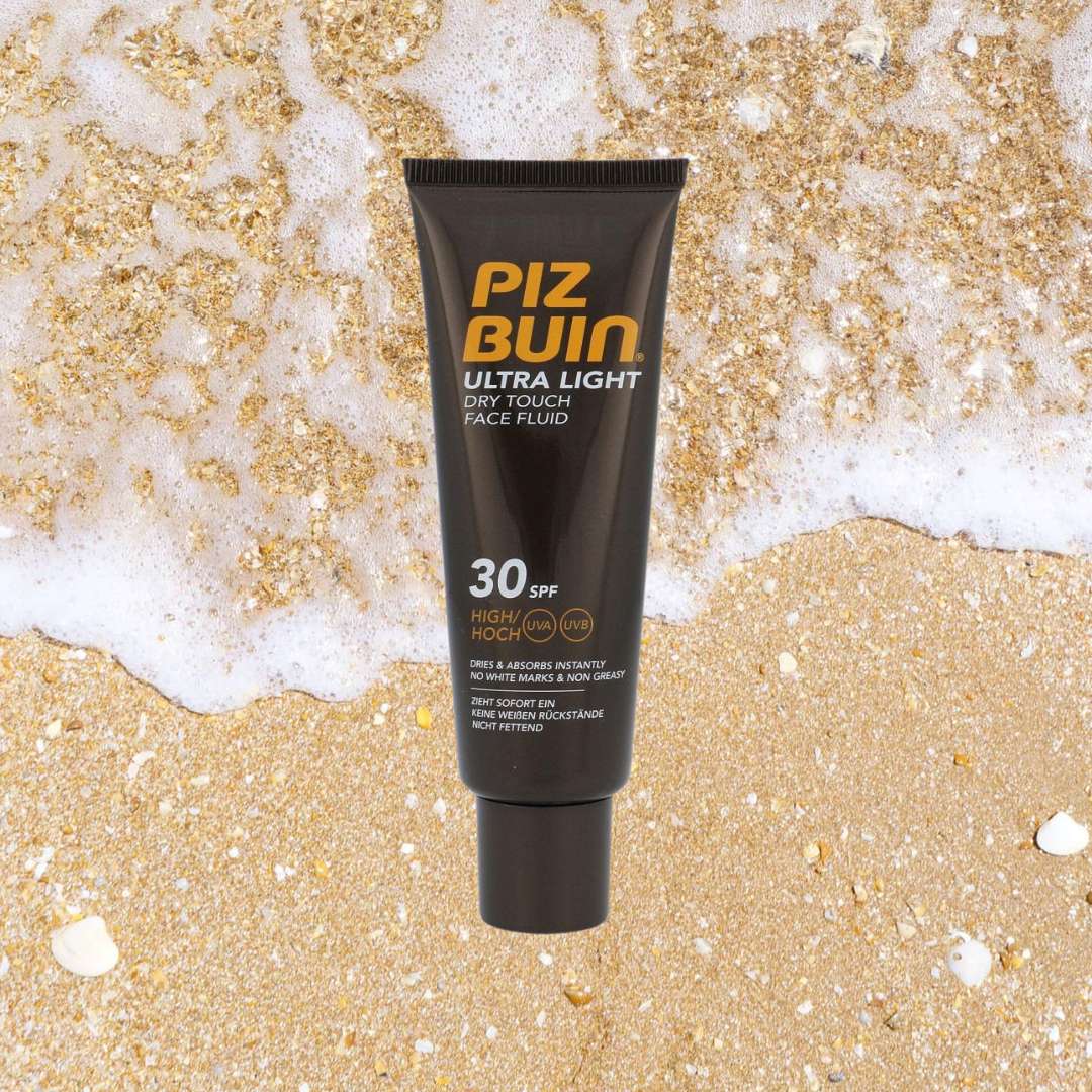 DRY TOUCH CREMA FLUIDA VISO 30+SPF - Assorbimento rapido
