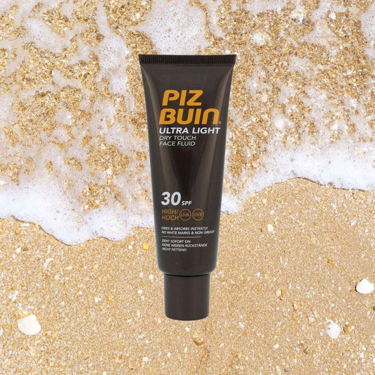 DRY TOUCH CREMA FLUIDA VISO 30+SPF - Assorbimento rapido